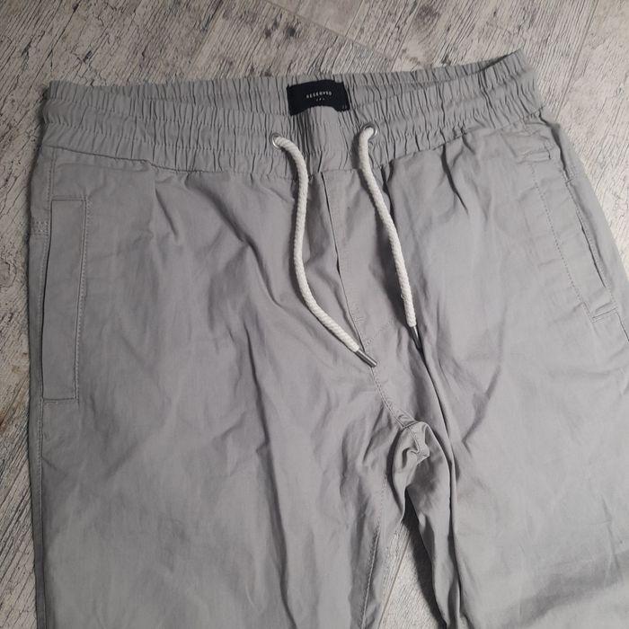 Szare bawełniane spodnie Reserved Rozm 164 cm