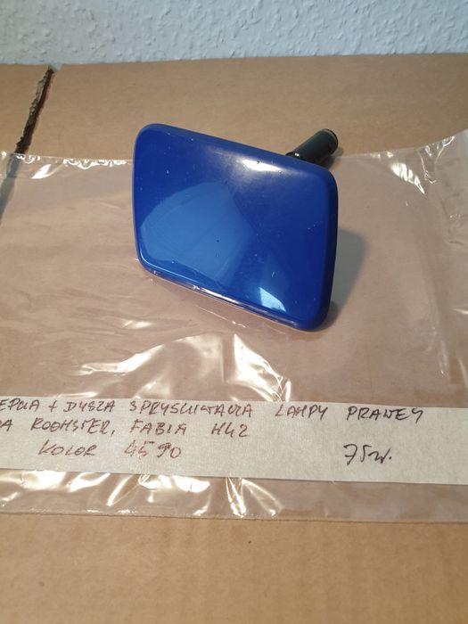 zaślepka + dysza spryskiwacza lampy prawej skoda roomster ,fabia mk2