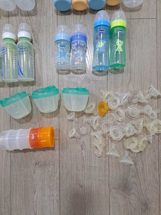 19 biberons/biberãos de várias marcas (Avent/Chicco/Dr. Browns)