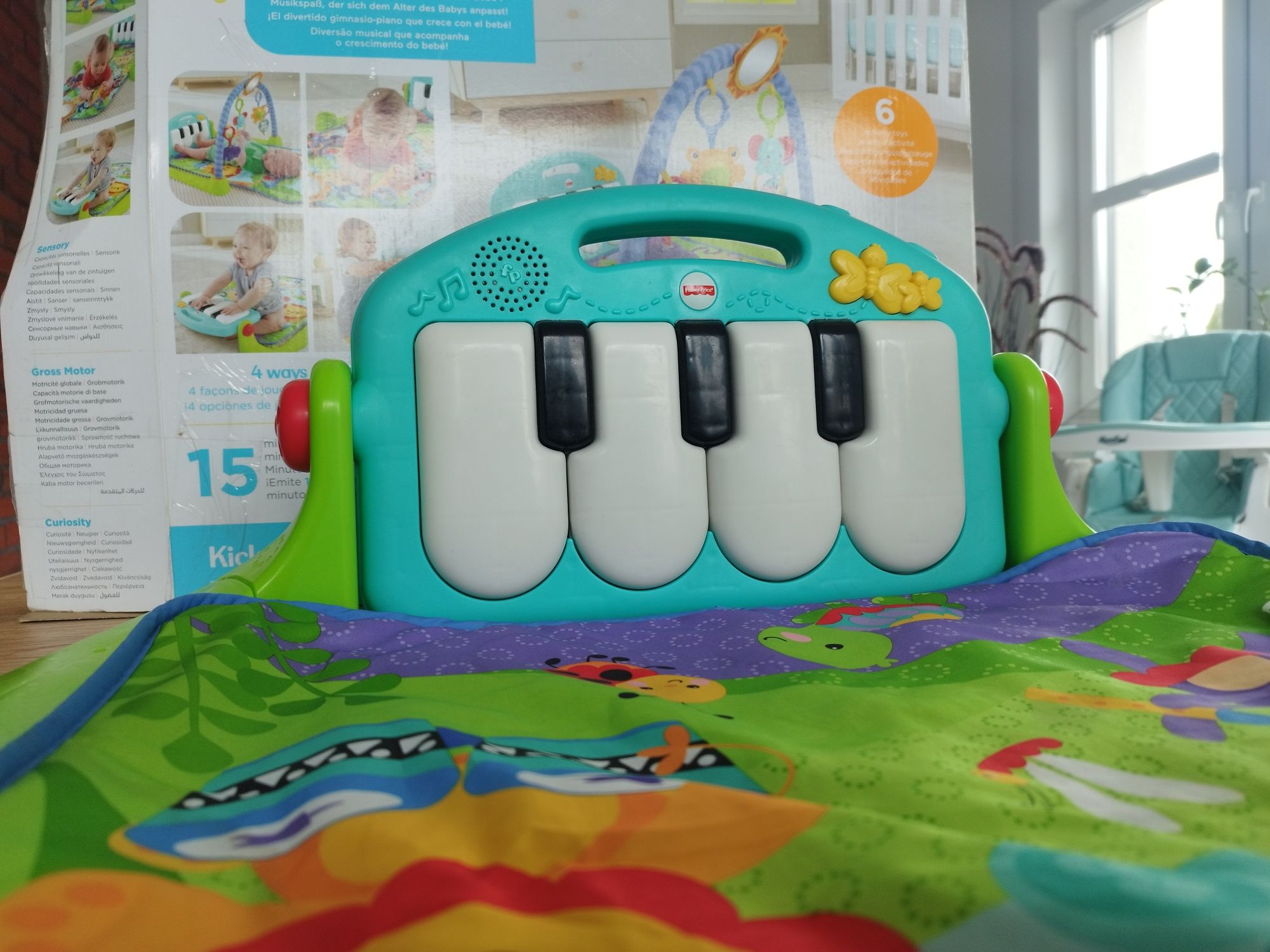 Fisher-price Mata edukacyjna z pianinkiem  siłowa mata grająca