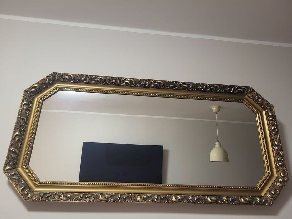 Kryształowe lustro w złotej ramie