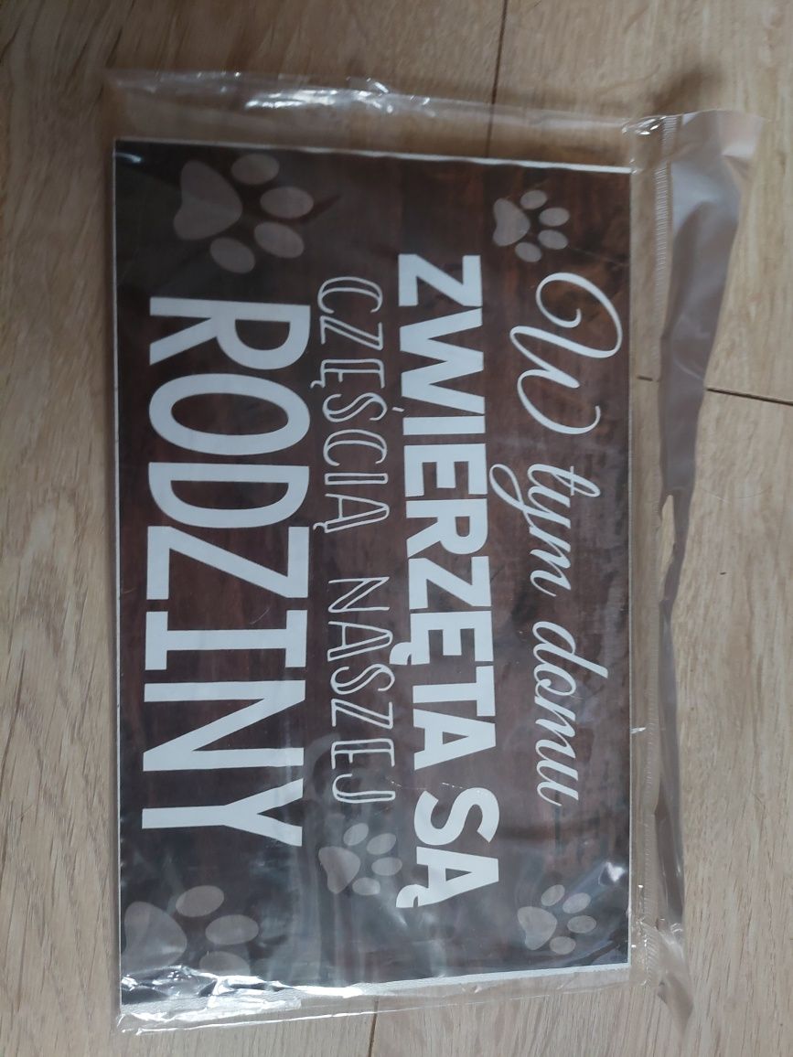 Tabliczka z napisem dla zwierzolubów