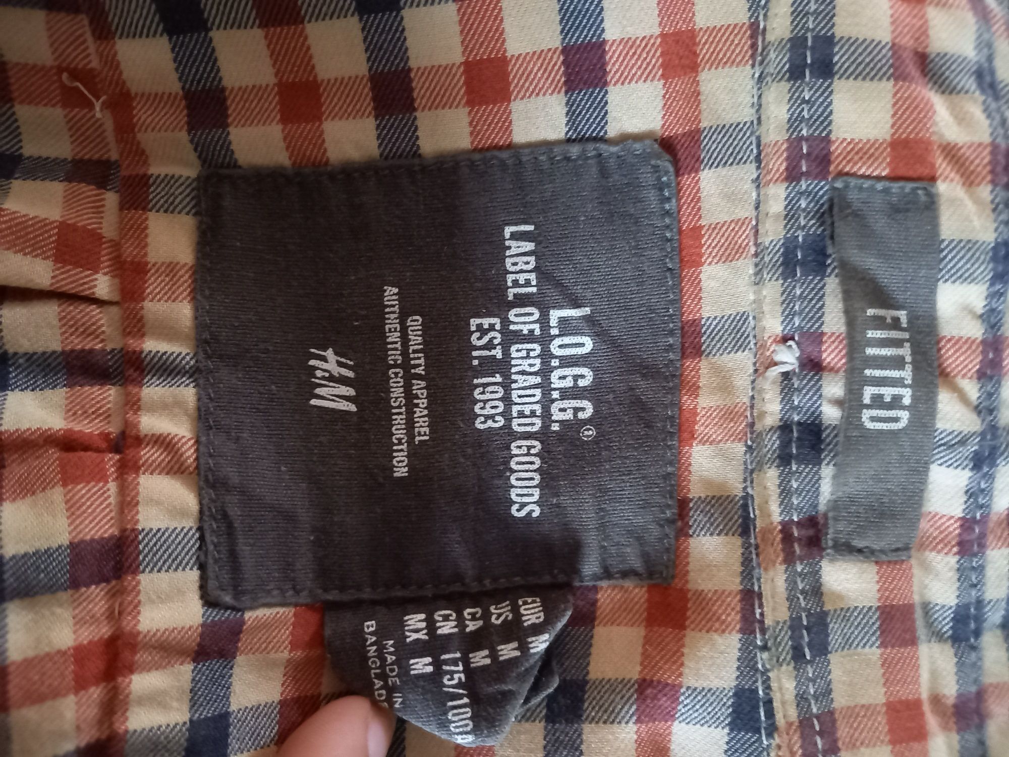 Camisas de marca de homem