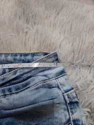 Spodnie jeansowe r. S dziury i przetarcia