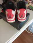 Jordan 4 retro red cement