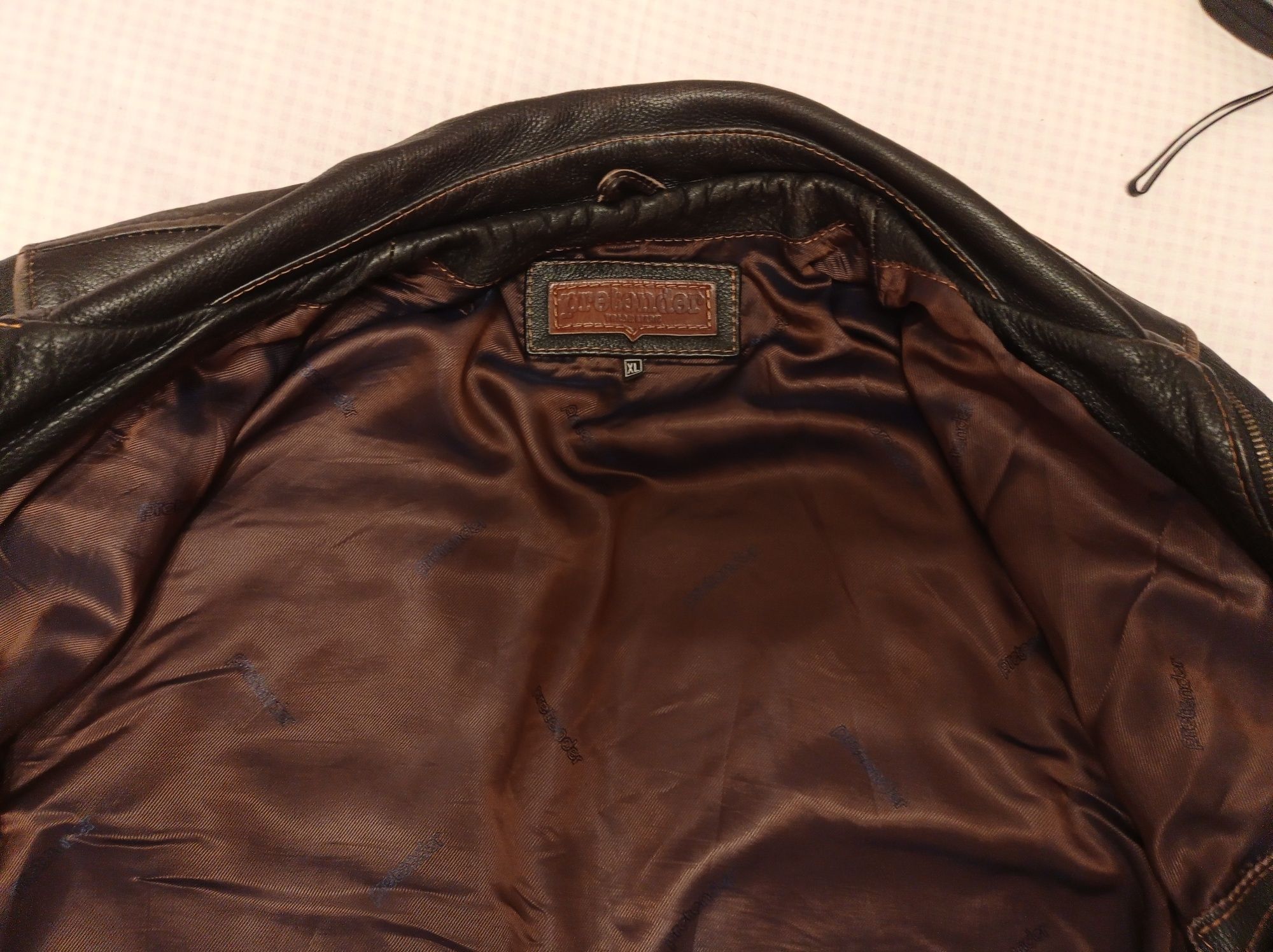Продам кожаную курточку, размер XL, фирма Pretender.