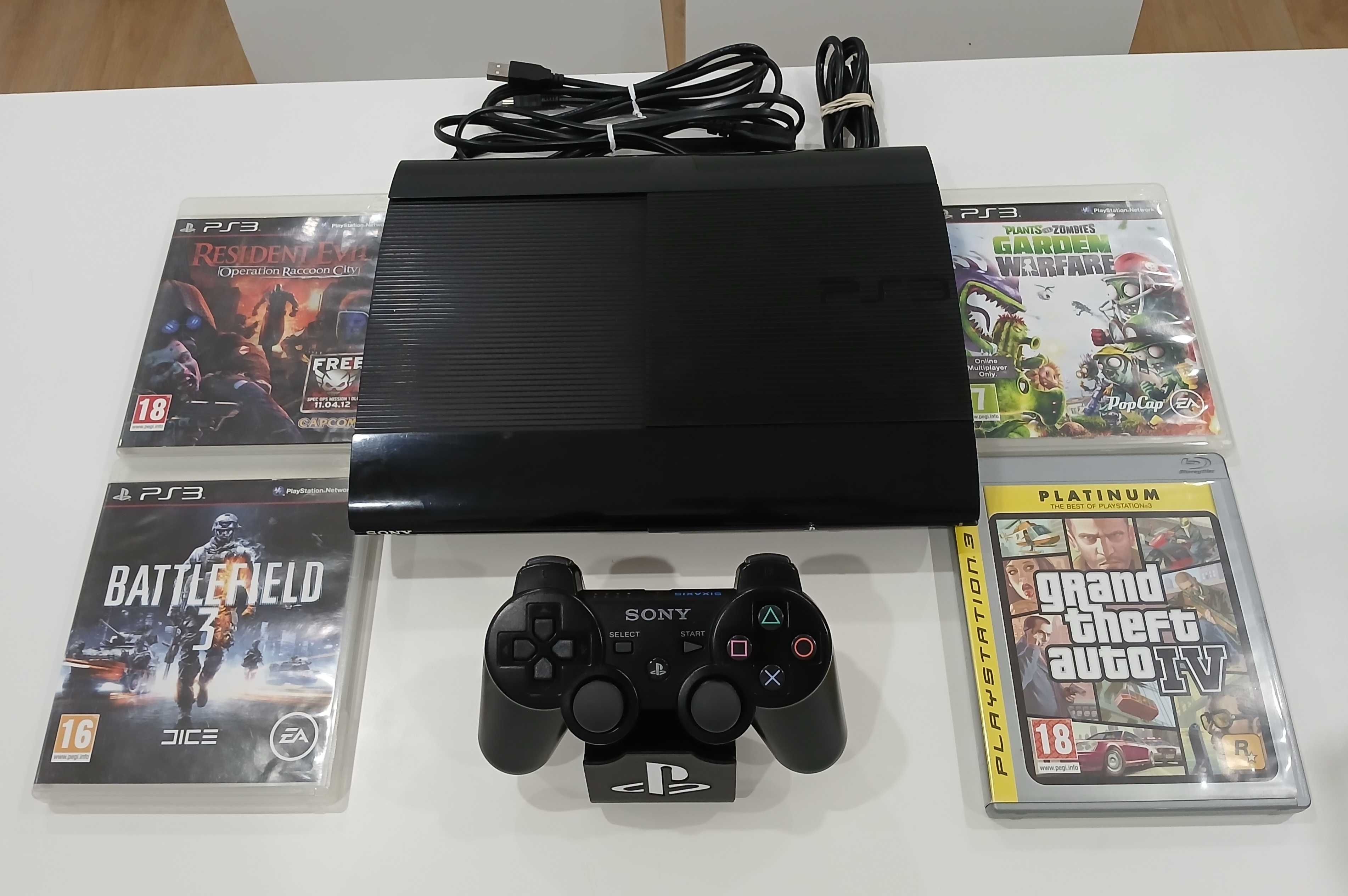 Ps3 super slim. Funcionando tudo perfeitamente.