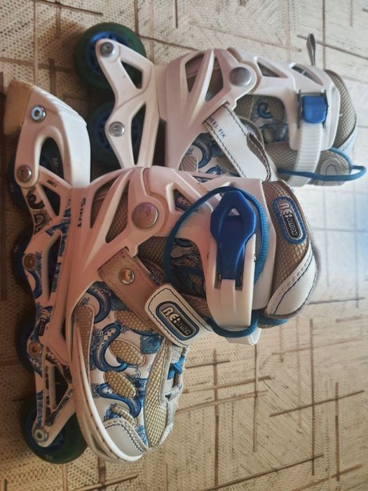 Роликовые коньки Re:Action р.26-31 б/у с защитой и шлемом