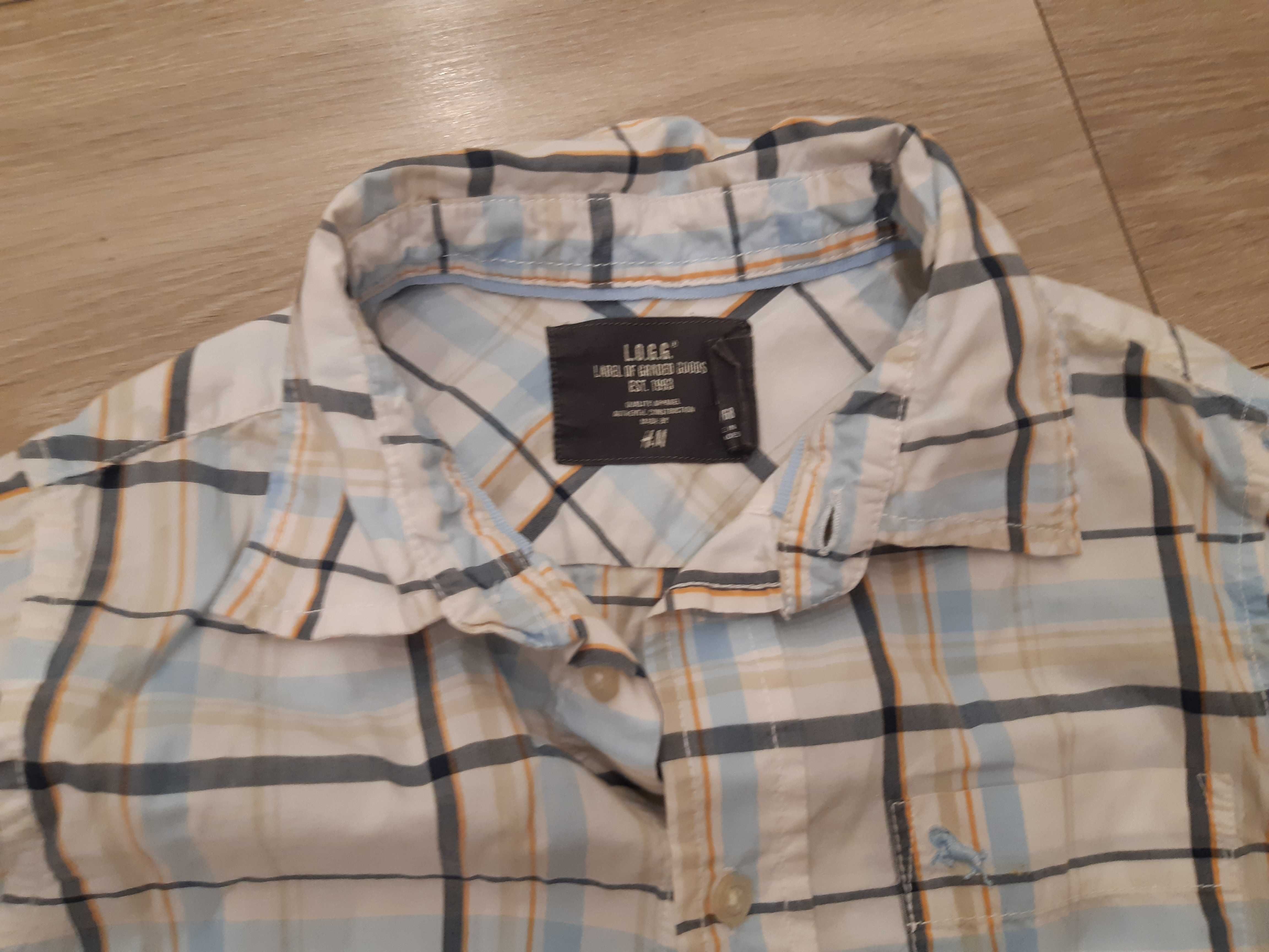 Bawelniana koszula w kratę dla chlopca z H&M.rozm.134 cm.cena 25 zl