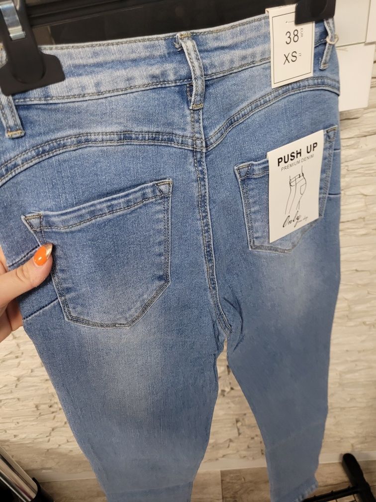 Nowe z metką spodnie jeansowe jeansy z serduszkami Push up XL