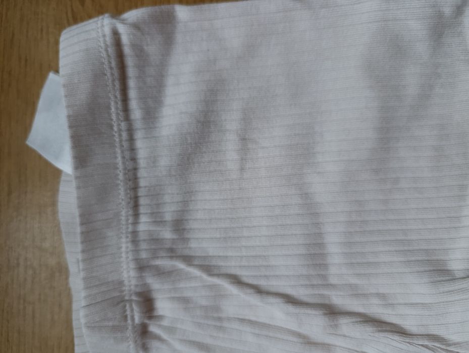 Довжина 66, напівобхват талії 24-32.