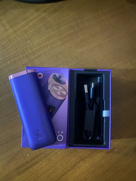 Máquina Glo em caixa com carregador como nova