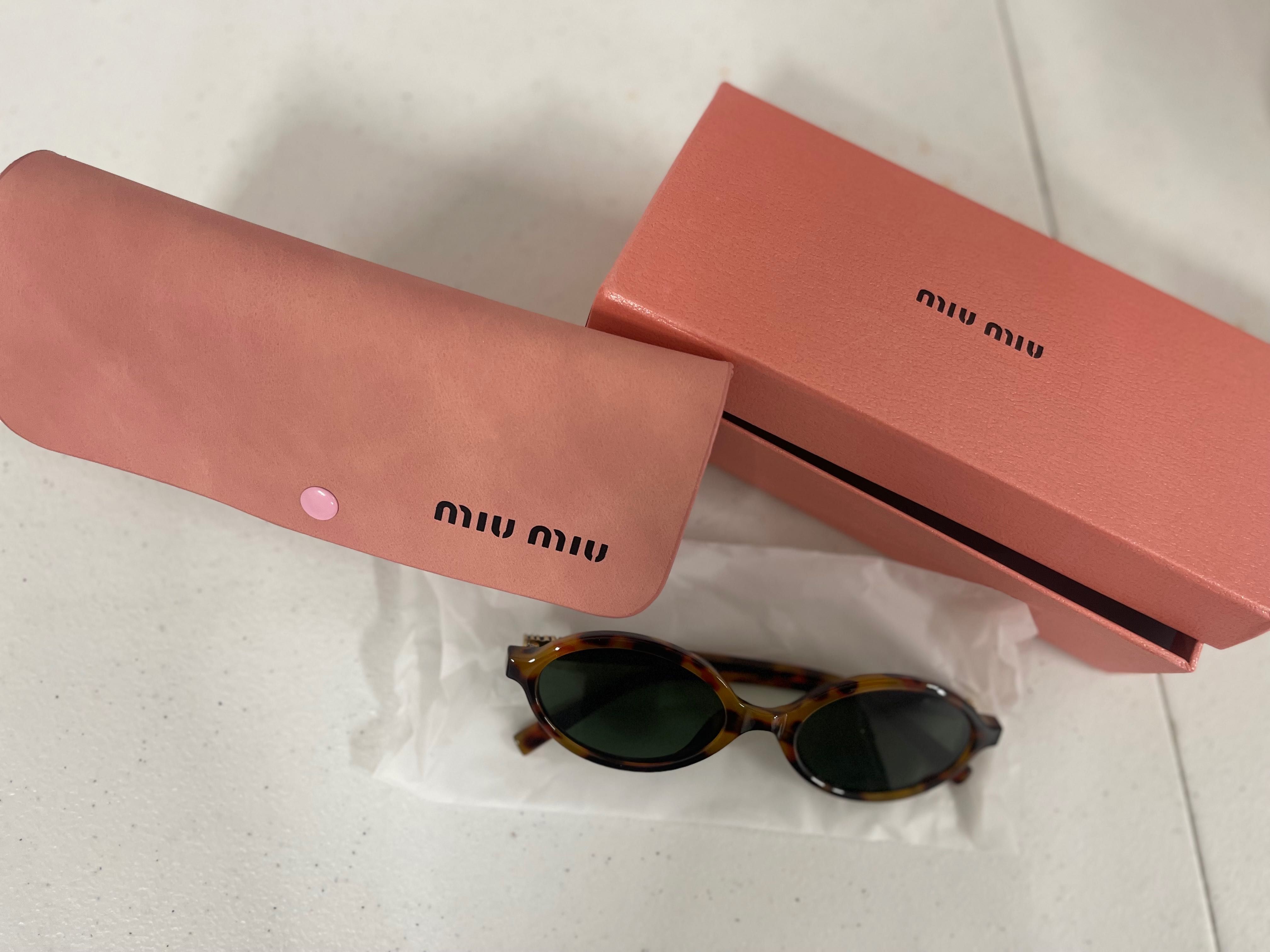 Óculos de sol miu miu