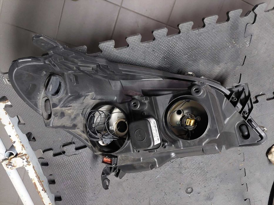 farol esq Opel Astra h