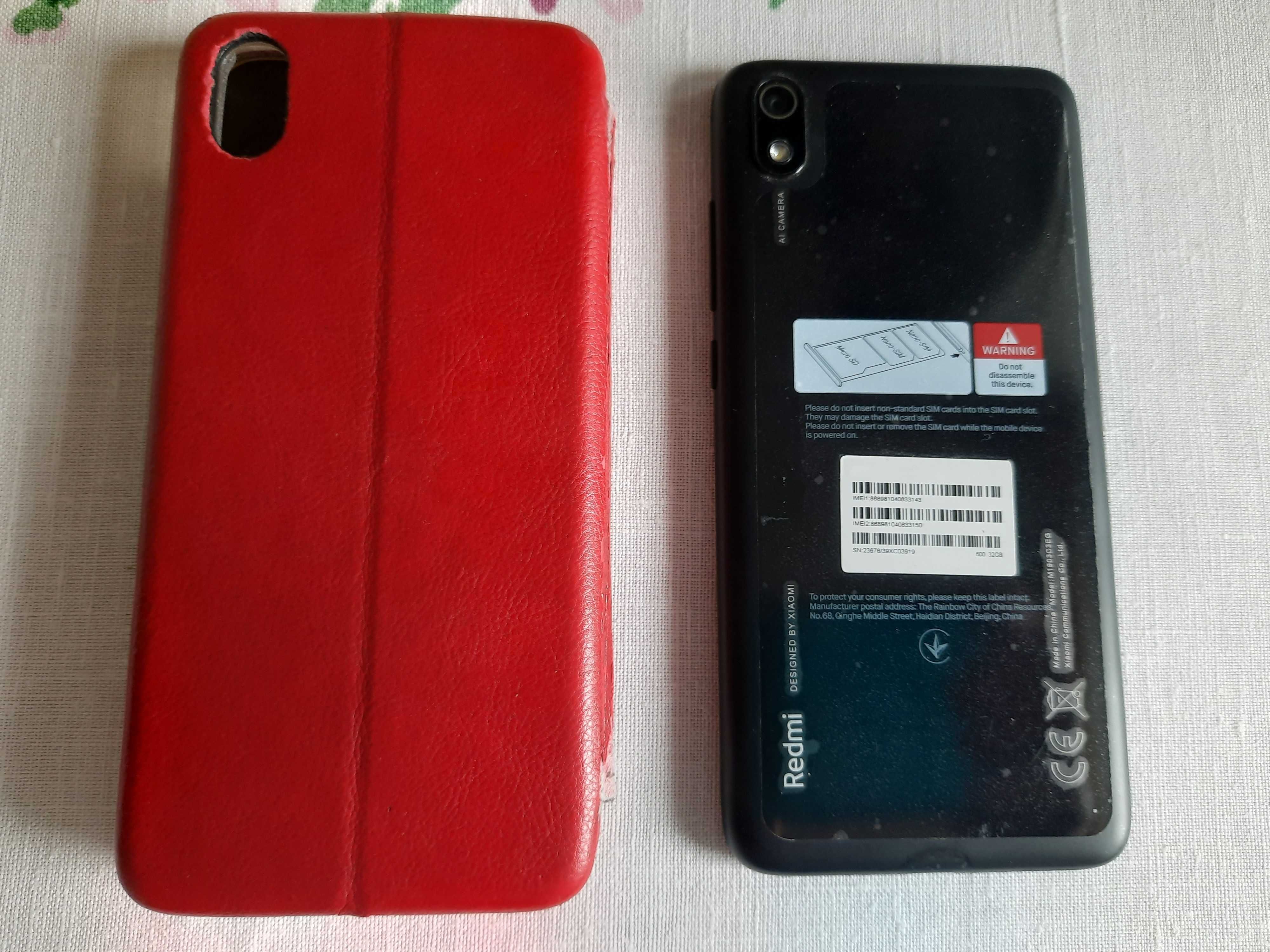 Телефон Xiaomi Redmi 7a черного цвета + чехол + зарядное.