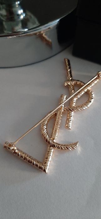 Złota broszka ysl model Opyum Cudo lv cc