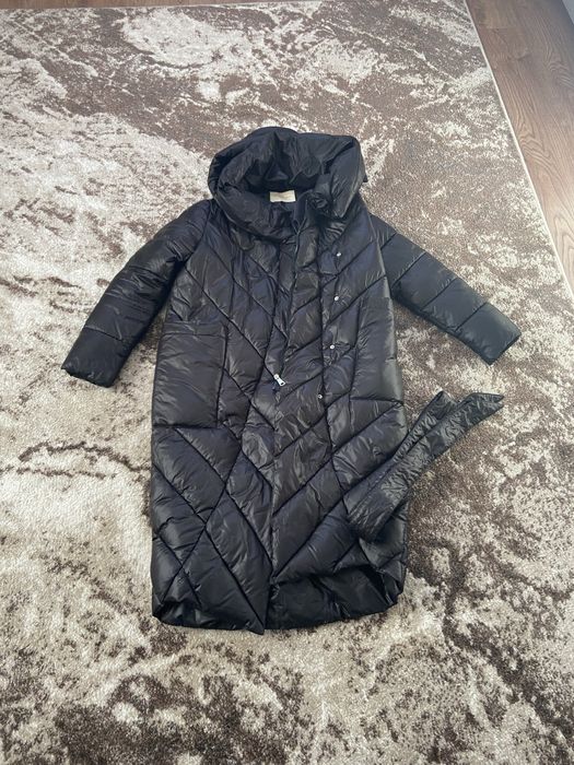 Пуховик жіночий в новому стані