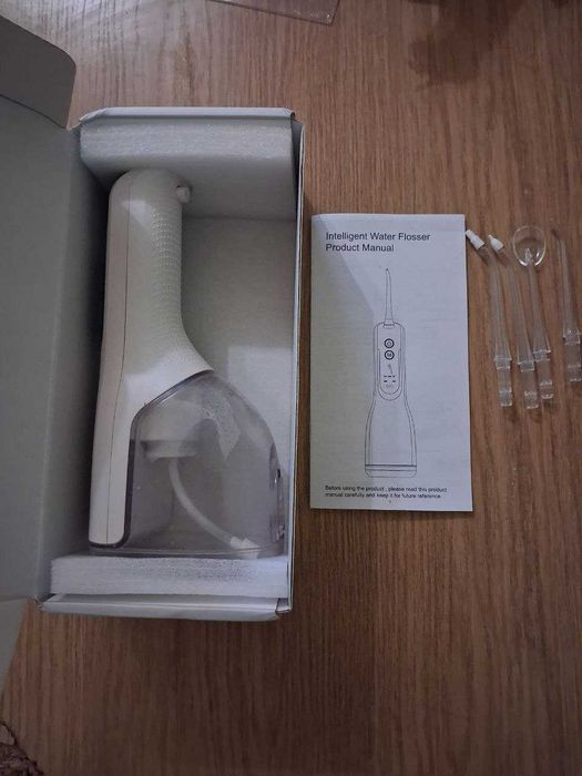 Iригатор для зубів з 5 режимами чищення у ідеальному стані