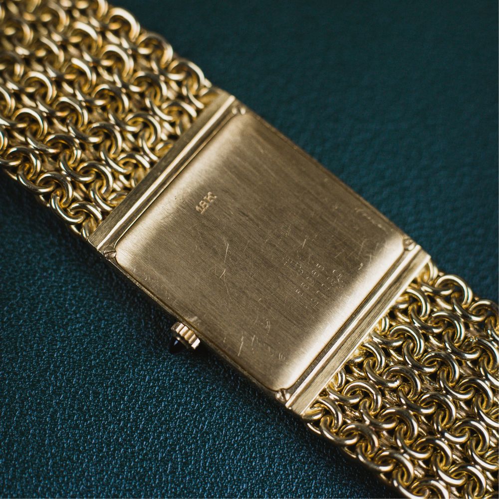 Relogio Corum em ouro amarelo 18k e mostrador Onyx e Diamantes