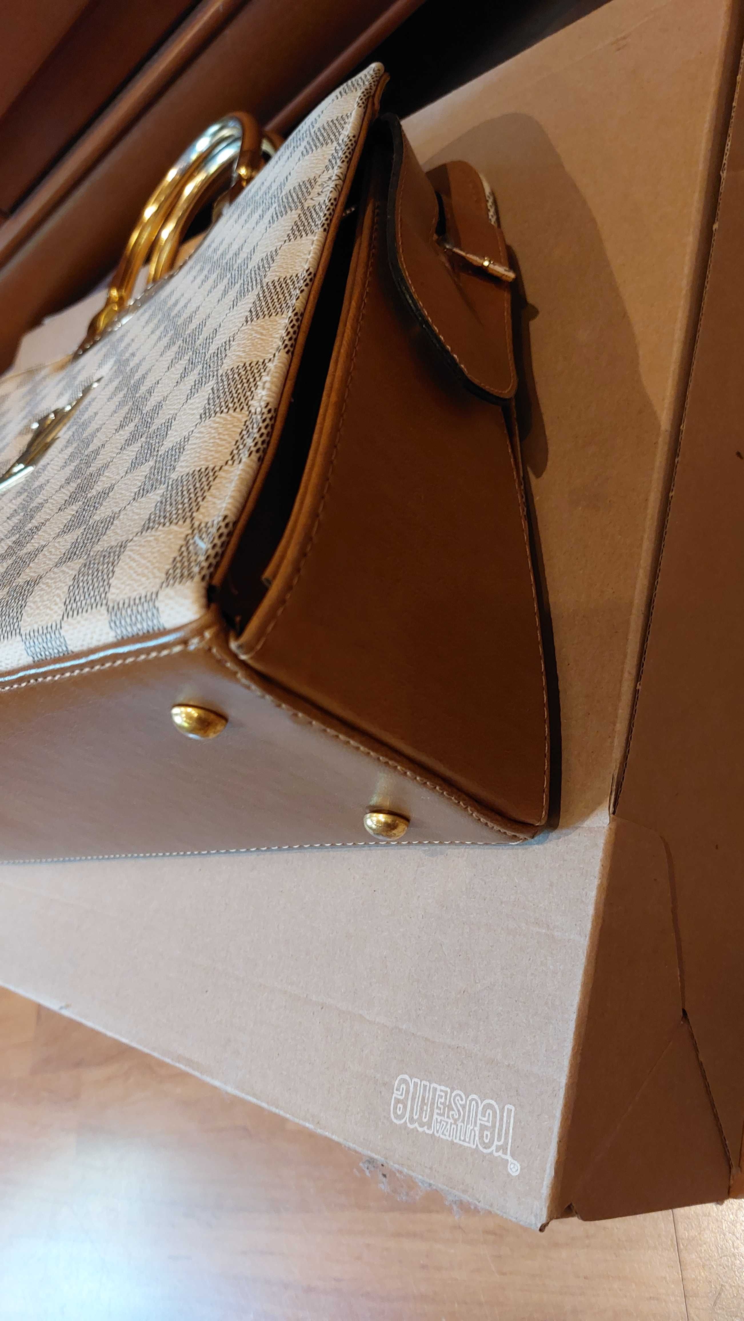 Louis Vuitton elegancka torebka do ręki stan idealny
