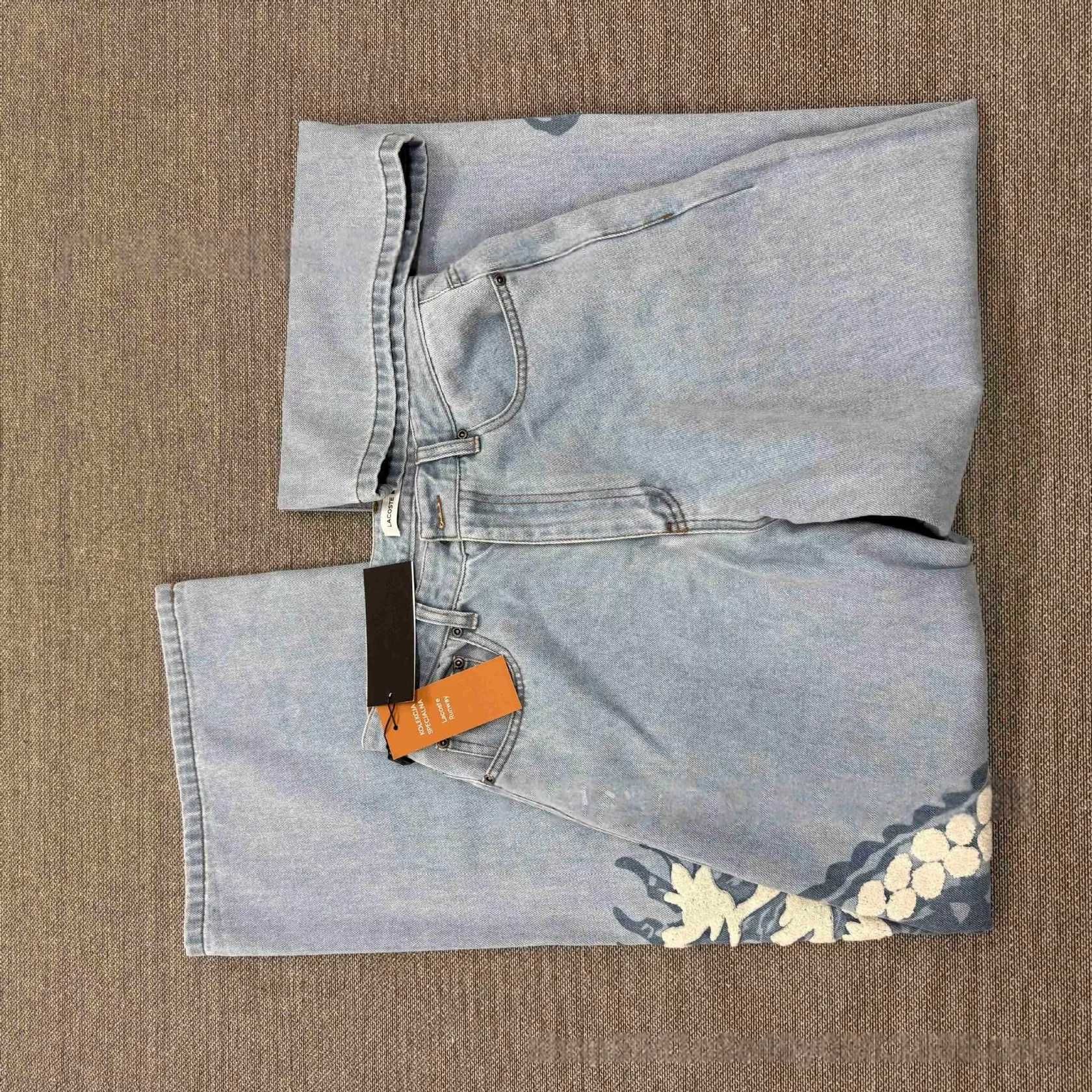 Джинси Lacoste з вишивкою
