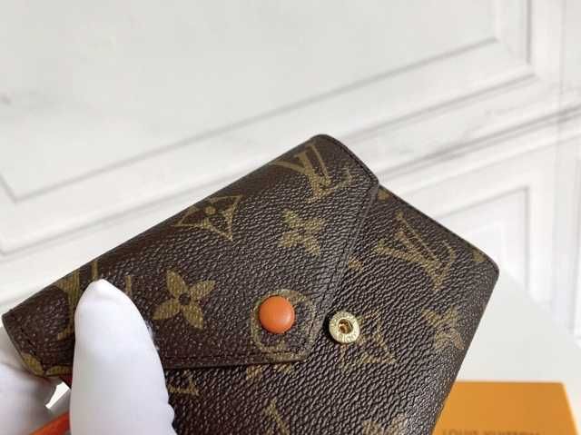 LOUIS VUITTON Victorine Klamra pomarańczowa