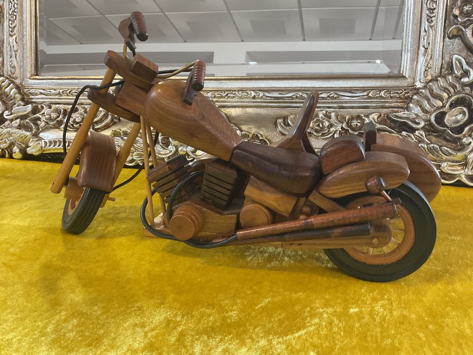 Mota em madeira decoração