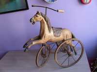 Stara zabawka - trójkołowy rowerek - koń