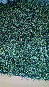 Carpete em tons de verde e preto