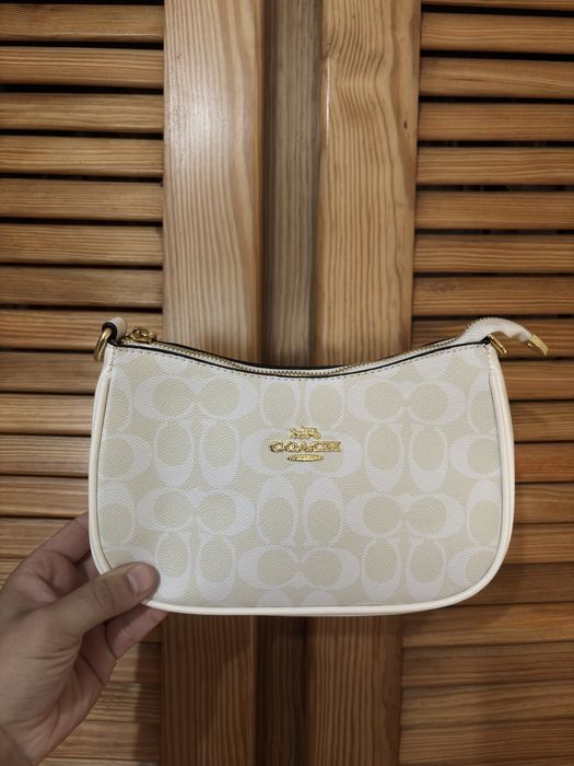 Mala Coach nova com caixa