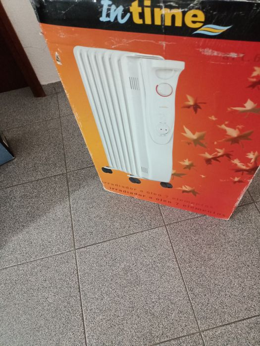 Aquecedor a óleo, com pouco uso.