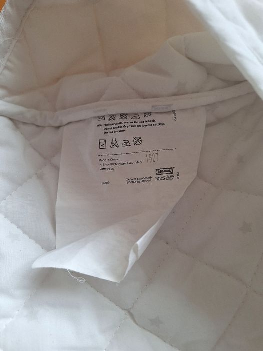 Ochraniacz do łóżeczka IKEA– Biały, pikowany, wyprawka dla dziecka