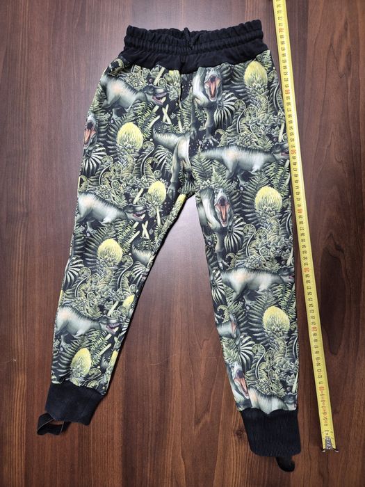 Spodnie softshell MAMMAMIA roz. 122 zielone w dinozaury