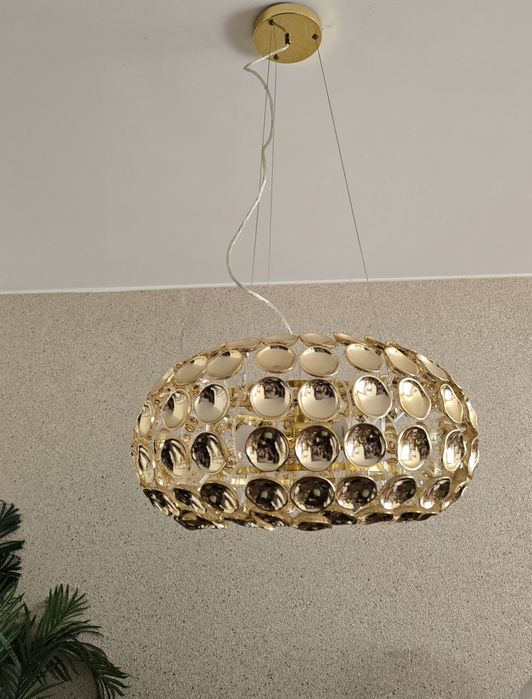 Vendo 2 candeeiros de tecto dourados novos