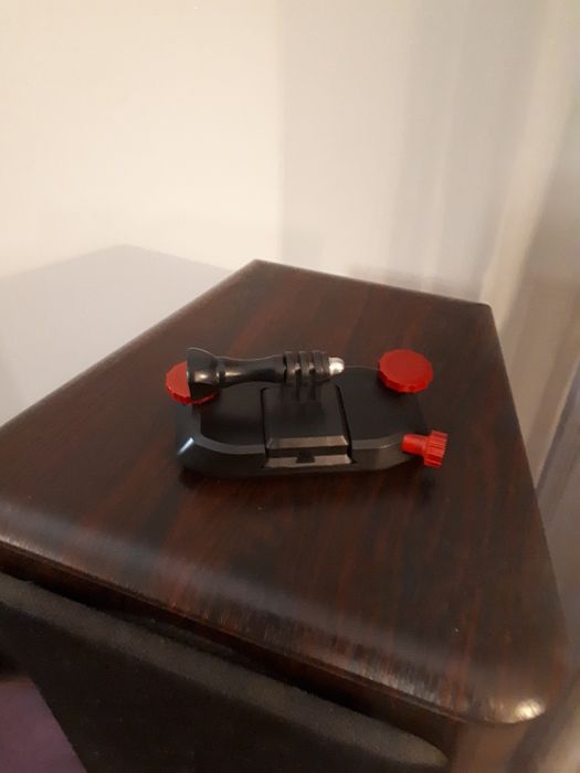 Suporte de Câmara Gopro para alça de mochila.