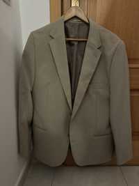 Blazer creme marca Canda at C&A