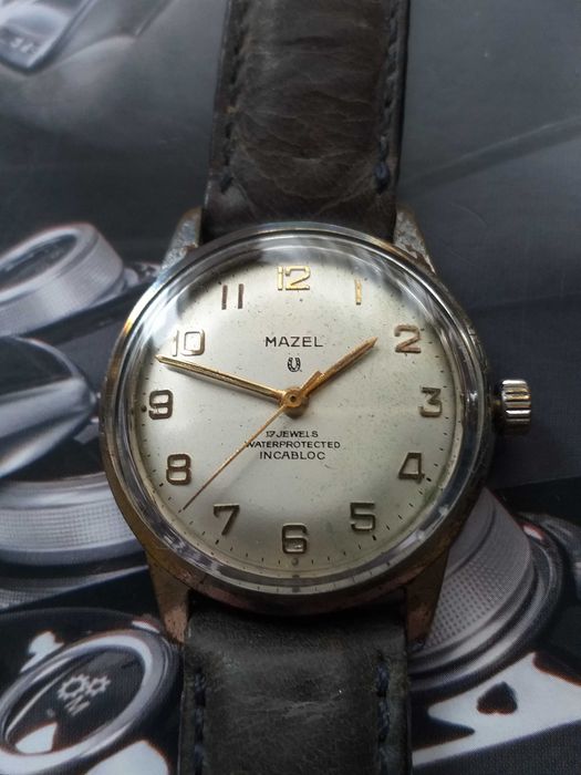 relogio mazel corda manual