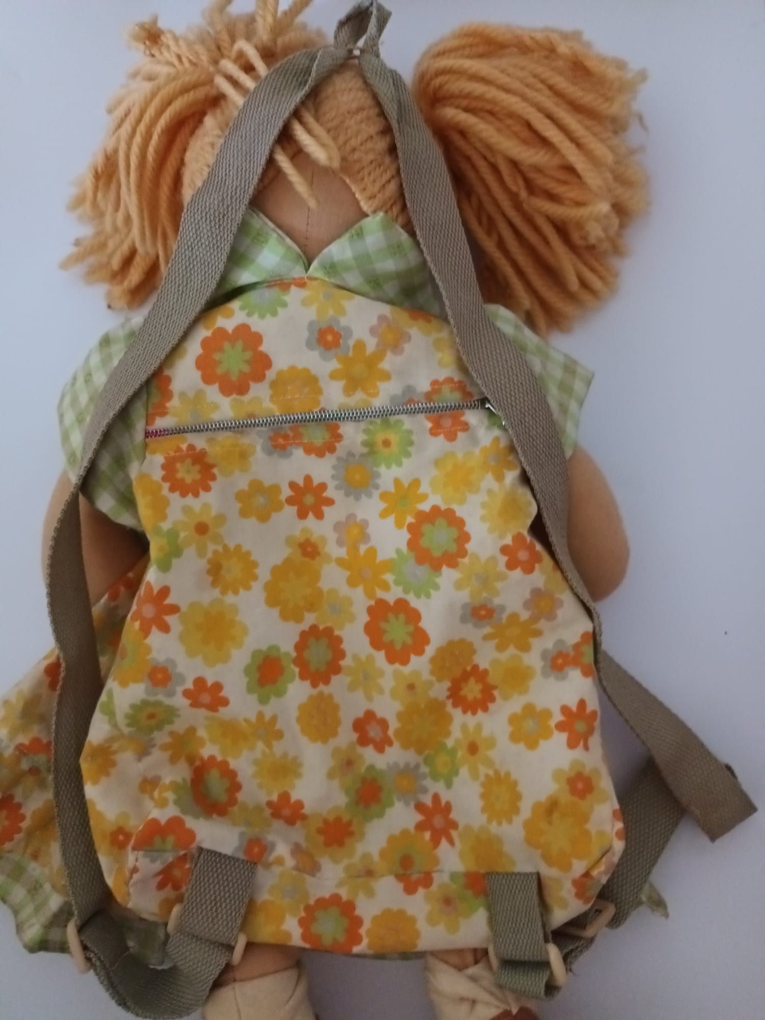 Boneca Mochila de Criança