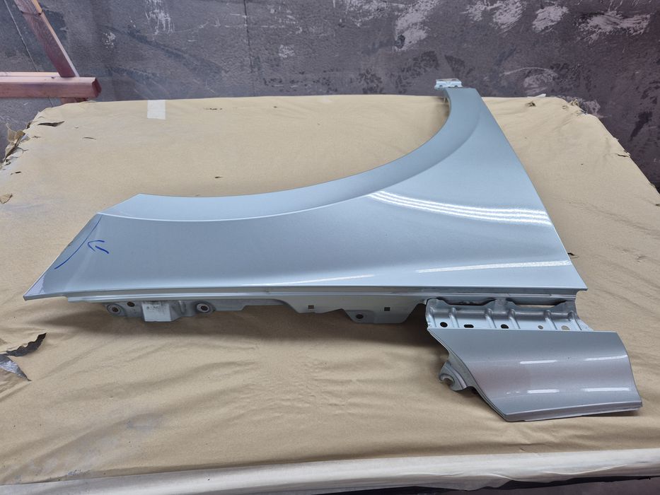 Skoda Enyaq IV 4 błotnik prawy przedni OEM 2021r