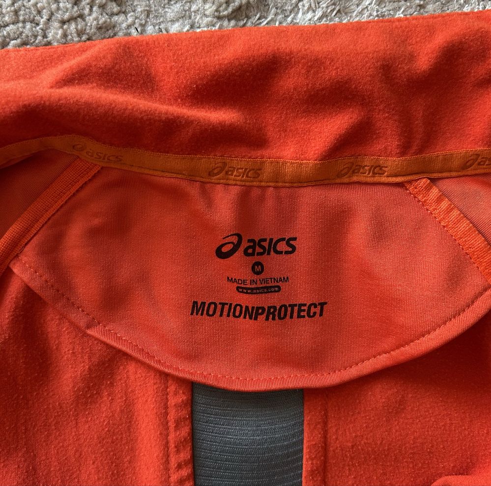 ASICS kurtka do biegania Lite Show Winter Jacket r.M