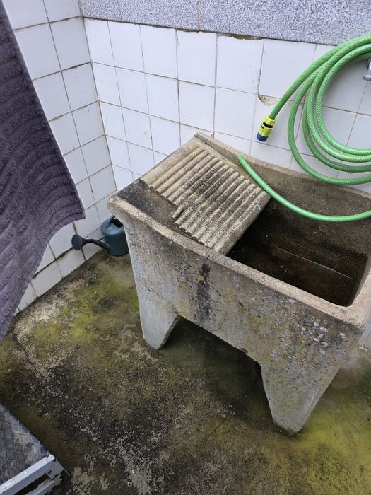 Taque de cimento para lavar roupa