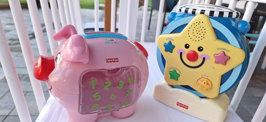 Projektor świnka Fisher Price melodie zabawka grająca