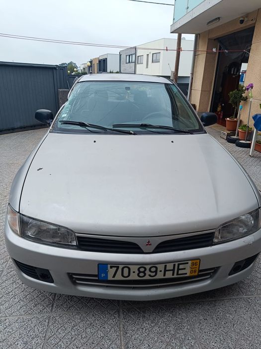 Mitsubishi Lancer 1.3 AC 4P acidentado na lateral