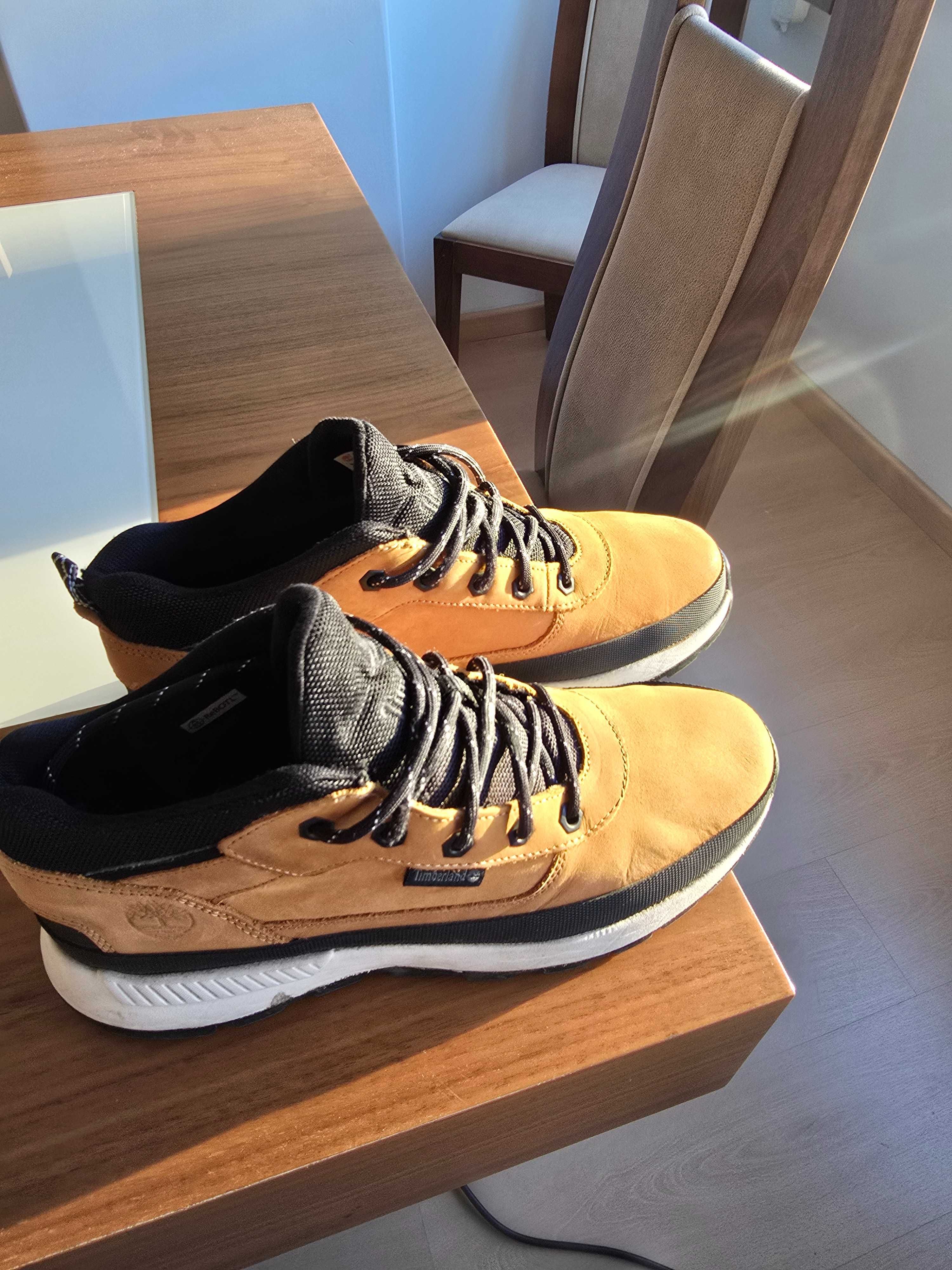 Ténis timberland tamanho 39, praticamente novos.