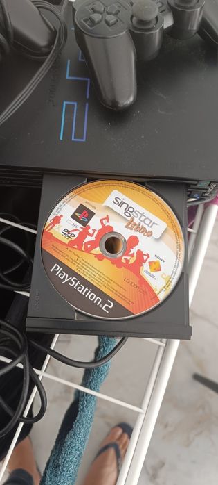 PlayStation 2, 3 Singstar + 1 jogo + câmara