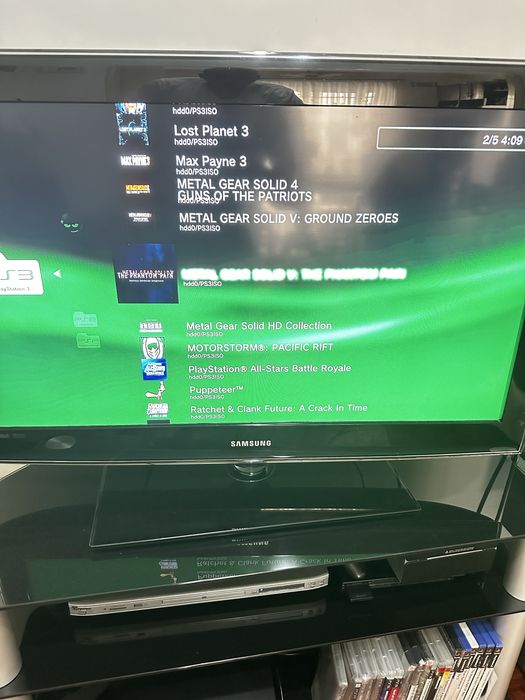 PS3 with custom firmware and multiple games64298077337474122