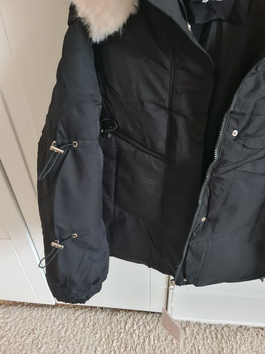 Продам новую куртку- пуховик  зима