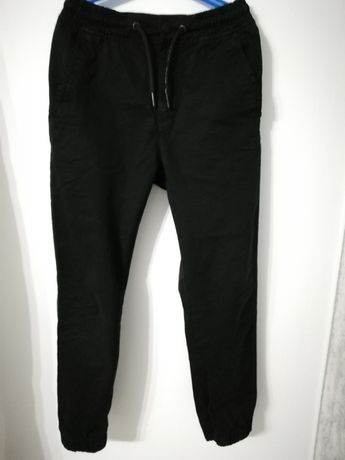 Spodnie czarne 152 Reserved nagawki ze ściągaczem  bawełna