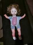 Boneca antiga com chia
