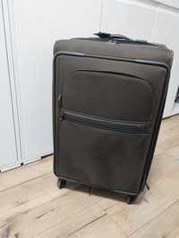 Tumi walizka brązowa na 4 kółkach z nylonu balistycznego.